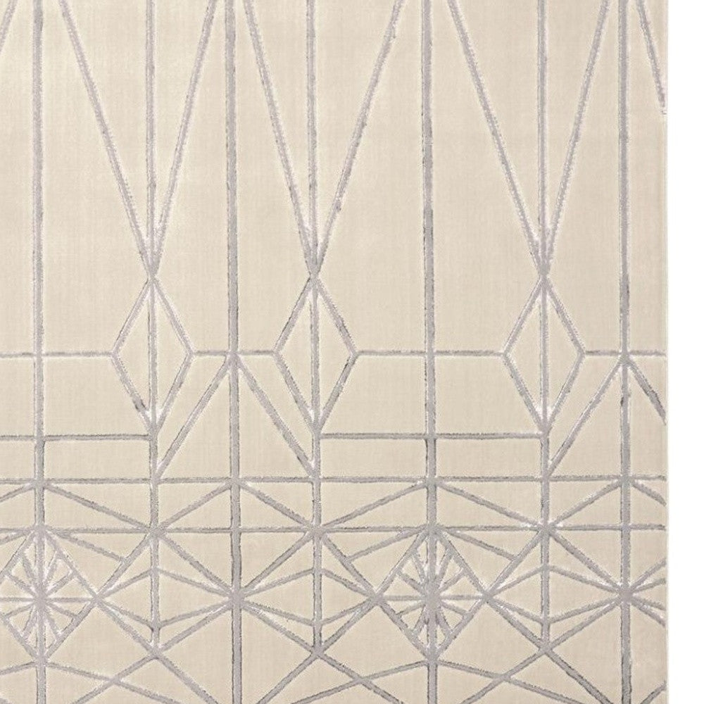 5' X 8' White Silver And Gray Geometric Stain Resistant Area Rug