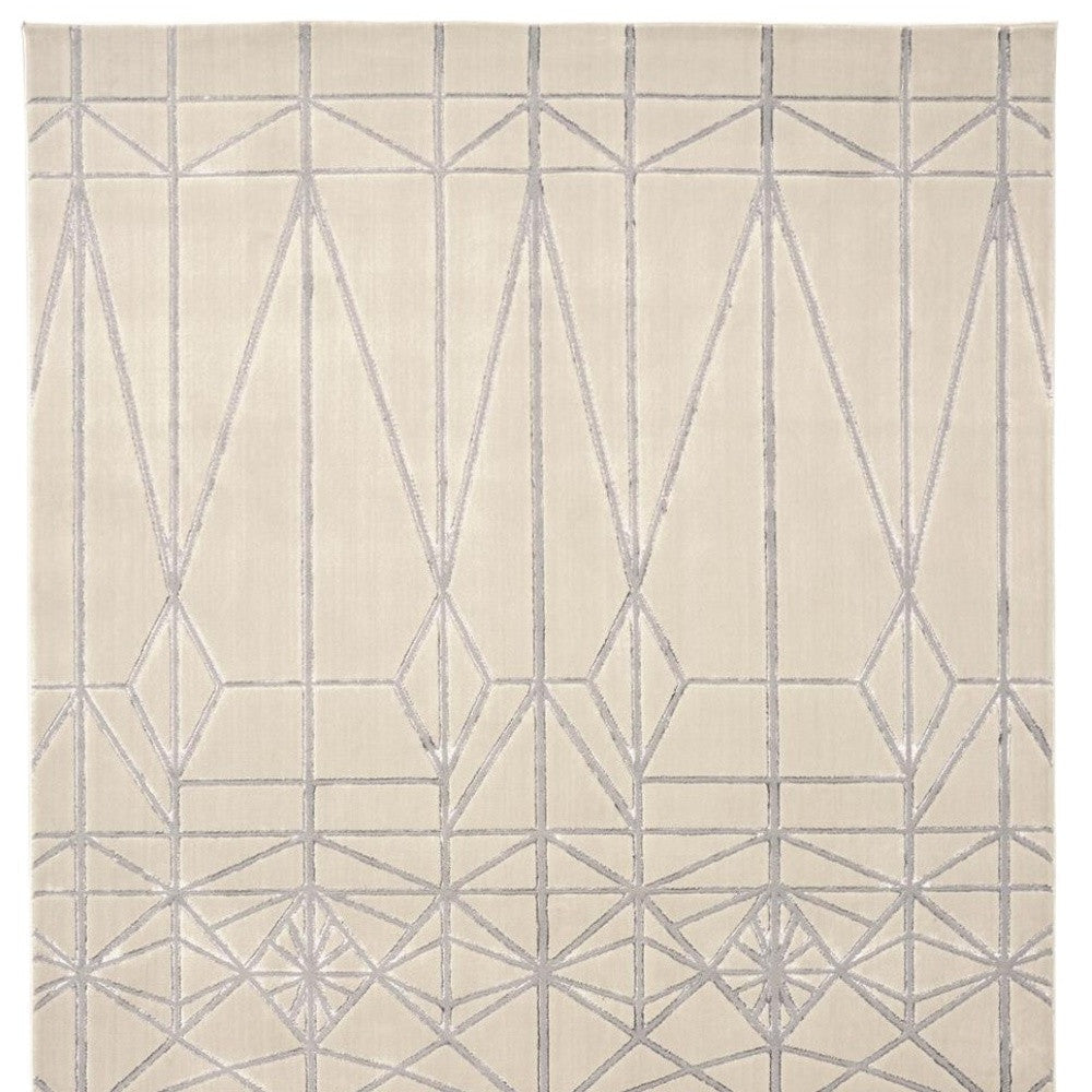 5' X 8' White Silver And Gray Geometric Stain Resistant Area Rug