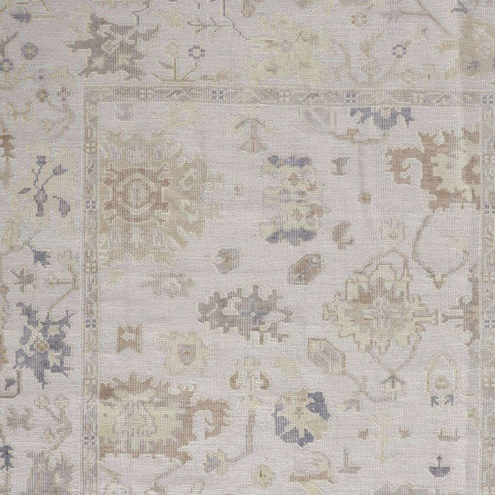 4' X 6' Tan Ivory And Orange Floral Hand Knotted Stain Resistant Area