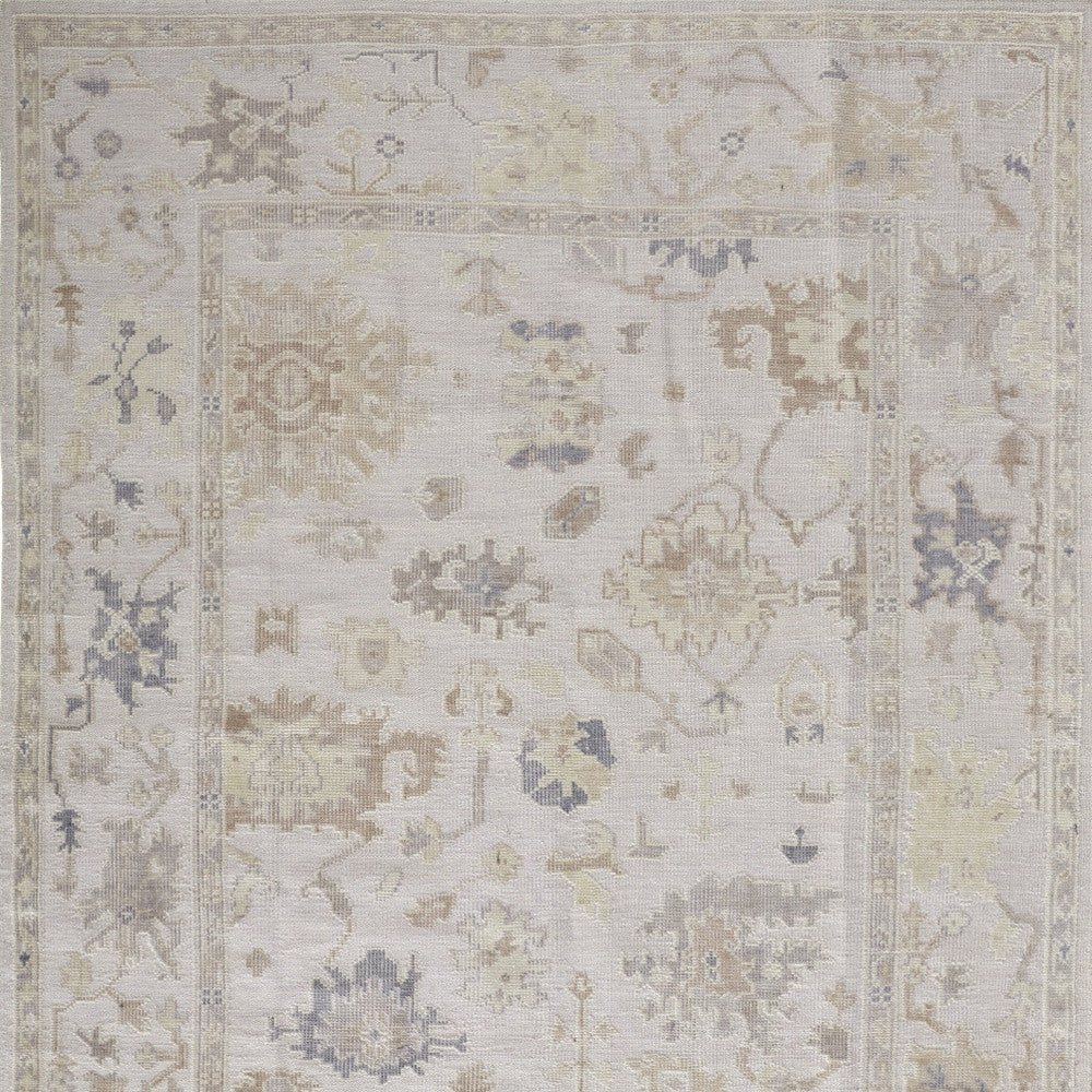 4' X 6' Tan Ivory And Orange Floral Hand Knotted Stain Resistant Area