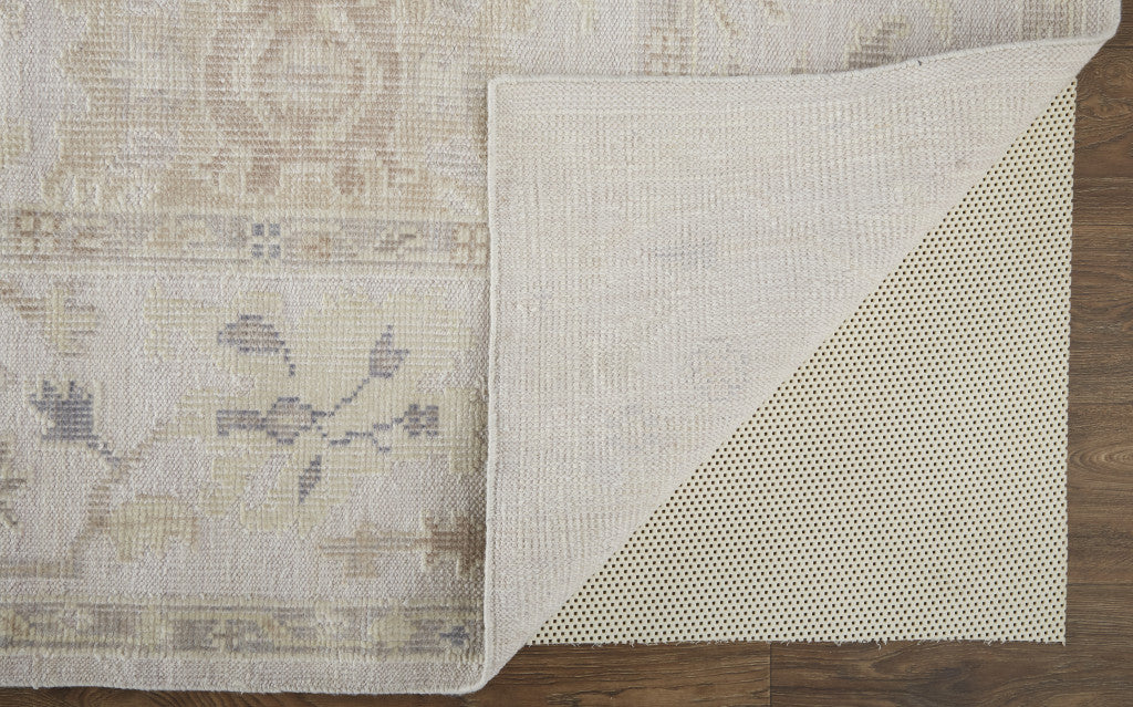 4' X 6' Tan Ivory And Orange Floral Hand Knotted Stain Resistant Area