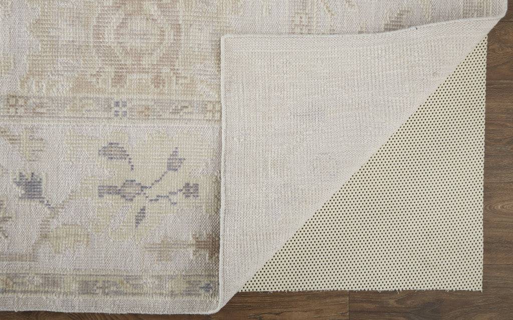 4' X 6' Tan Ivory And Orange Floral Hand Knotted Stain Resistant Area