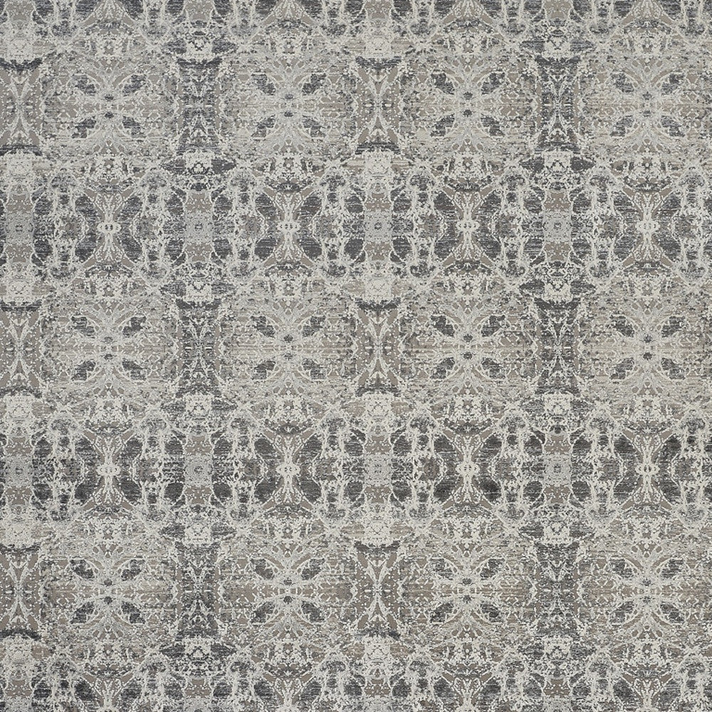 3' X 5' Ivory Taupe and Gray Oriental Power Loom Area Rug With Fringe