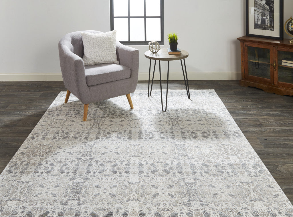 3' X 5' Ivory Taupe and Gray Oriental Power Loom Area Rug With Fringe