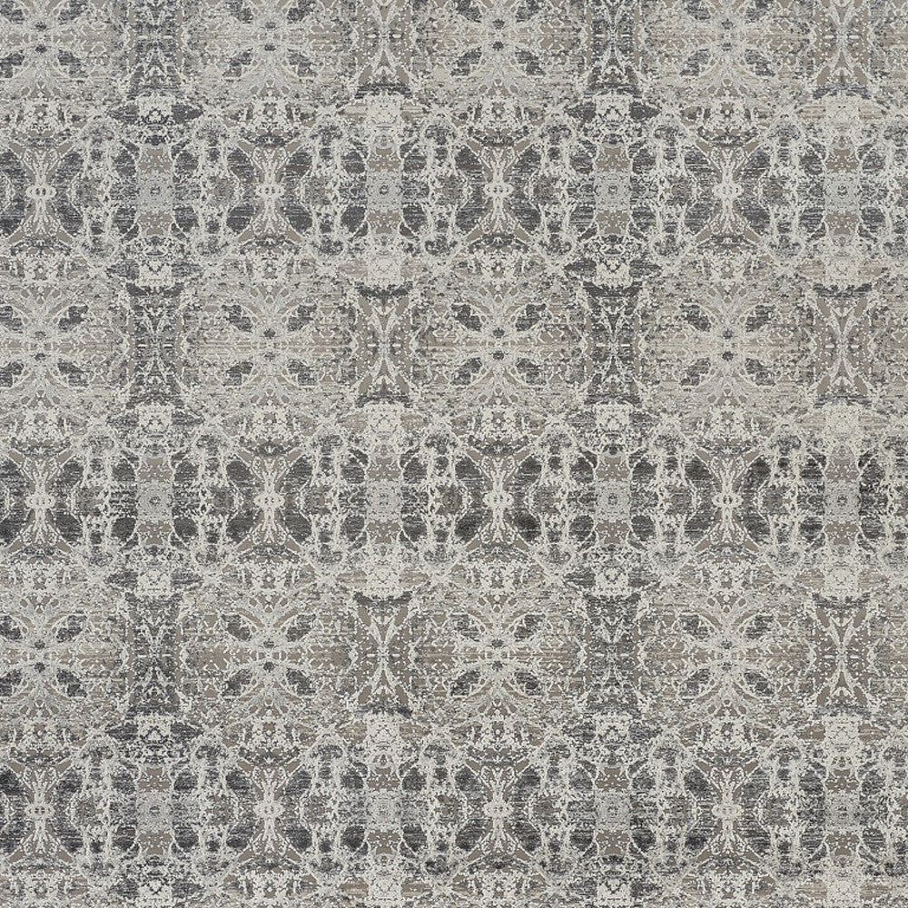 3' X 5' Ivory Taupe and Gray Oriental Power Loom Area Rug With Fringe