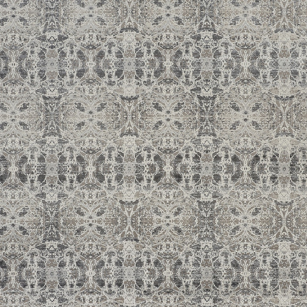 3' X 5' Ivory Taupe and Gray Oriental Power Loom Area Rug With Fringe