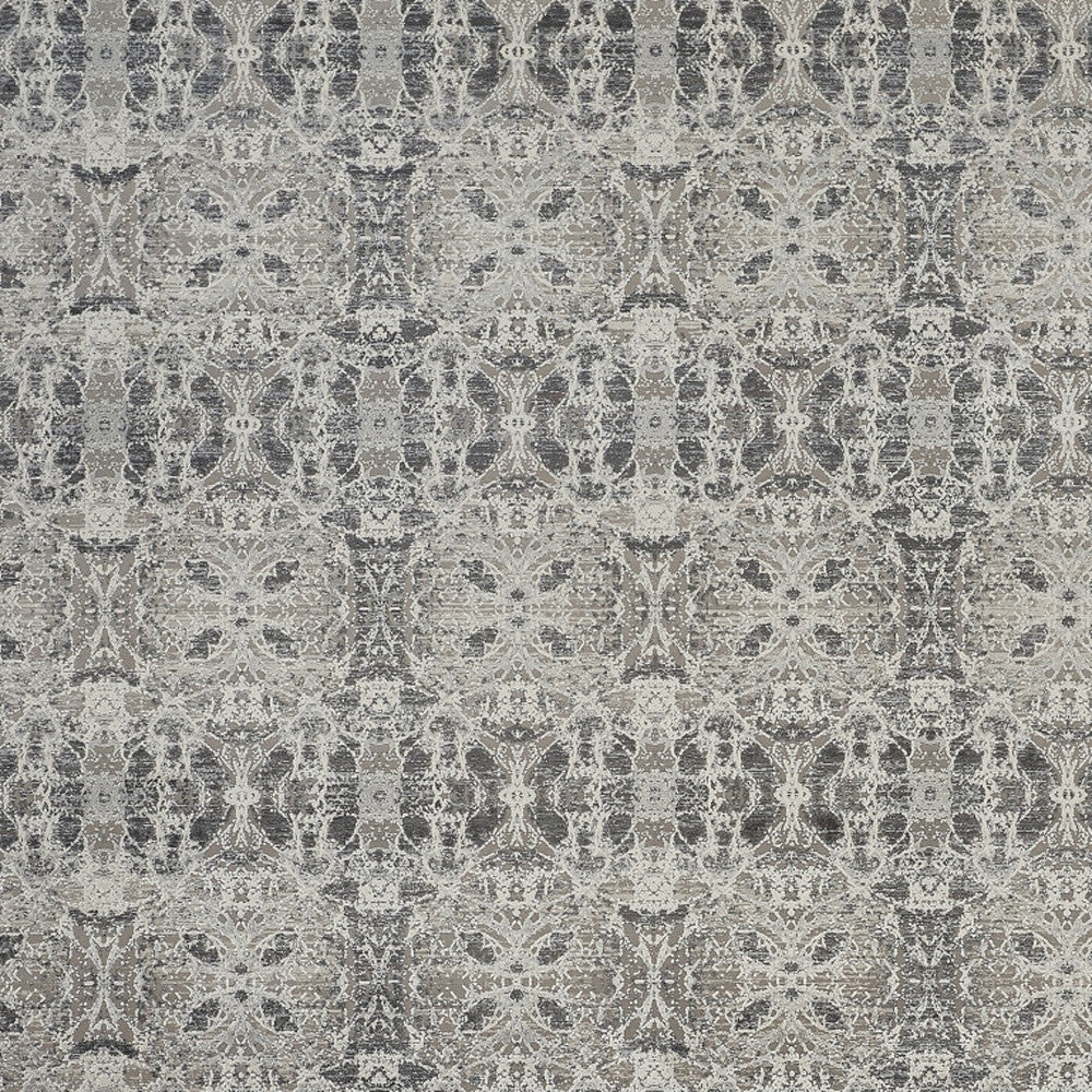 3' X 5' Ivory Taupe and Gray Oriental Power Loom Area Rug With Fringe