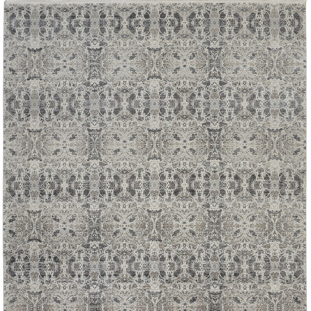 3' X 5' Ivory Taupe and Gray Oriental Power Loom Area Rug With Fringe