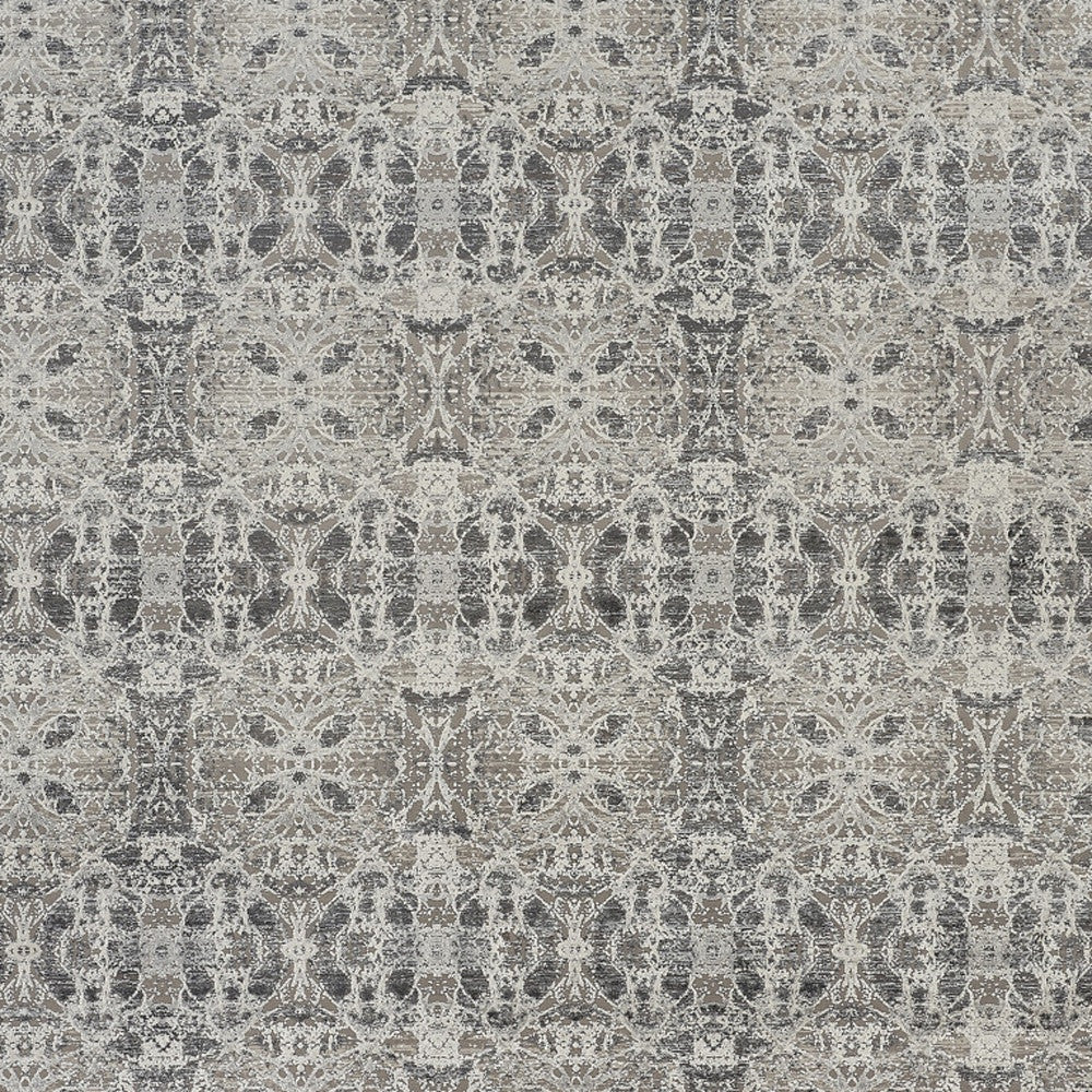 3' X 5' Ivory Taupe and Gray Oriental Power Loom Area Rug With Fringe