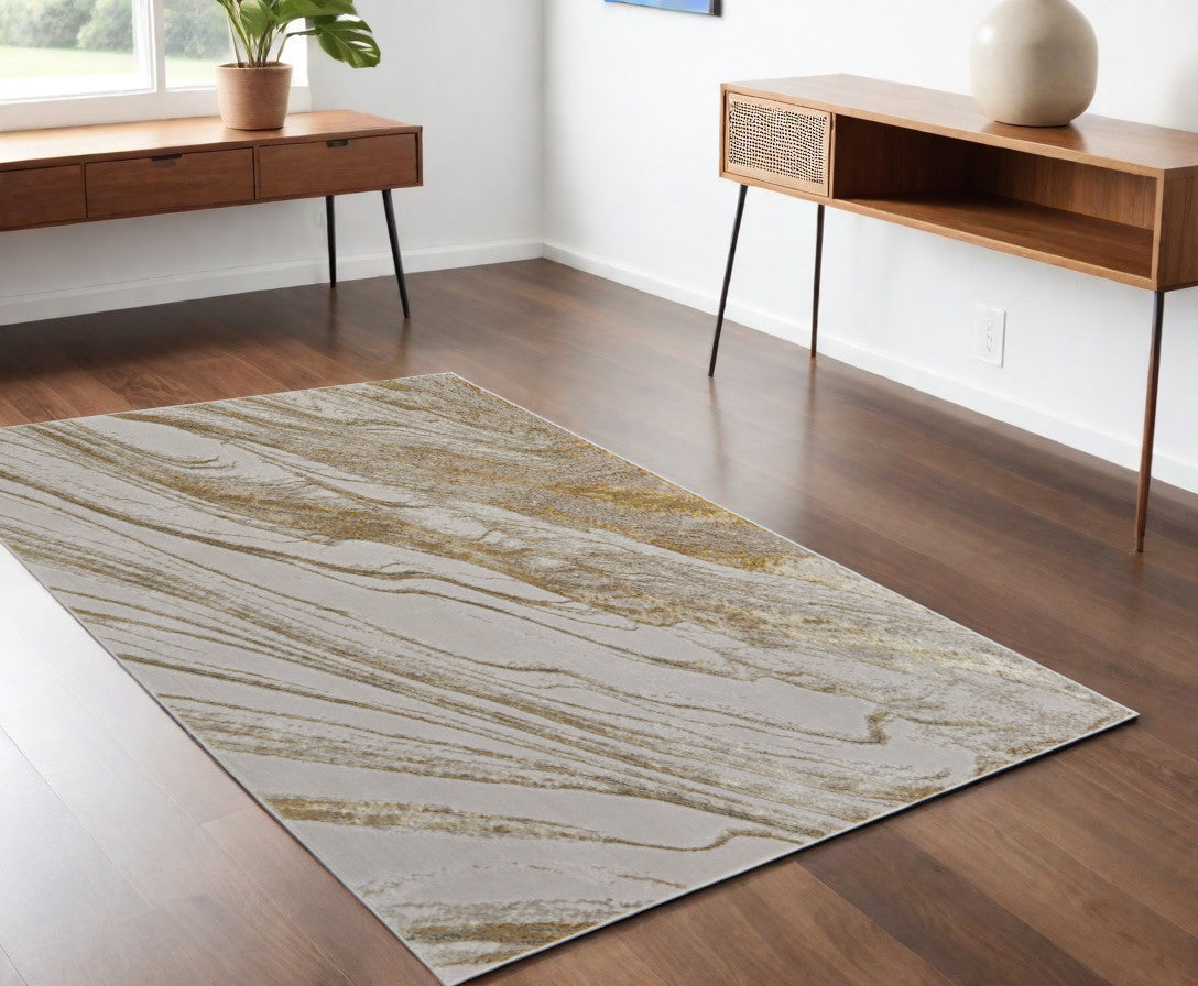 8' X 10' Ivory Brown and Gold Abstract Power Loom Area Rug