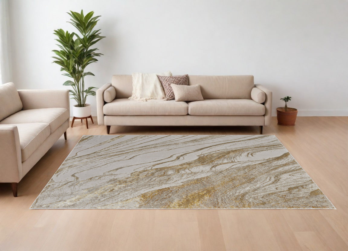 8' X 10' Ivory Brown and Gold Abstract Power Loom Area Rug